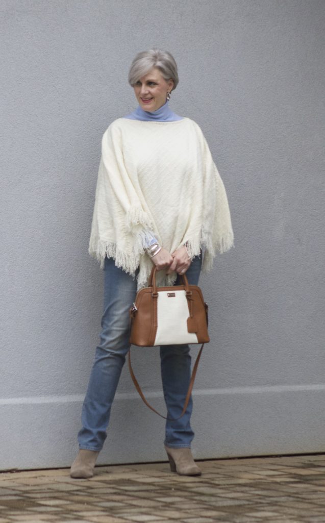 put a poncho on