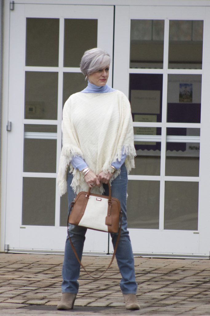 put a poncho on