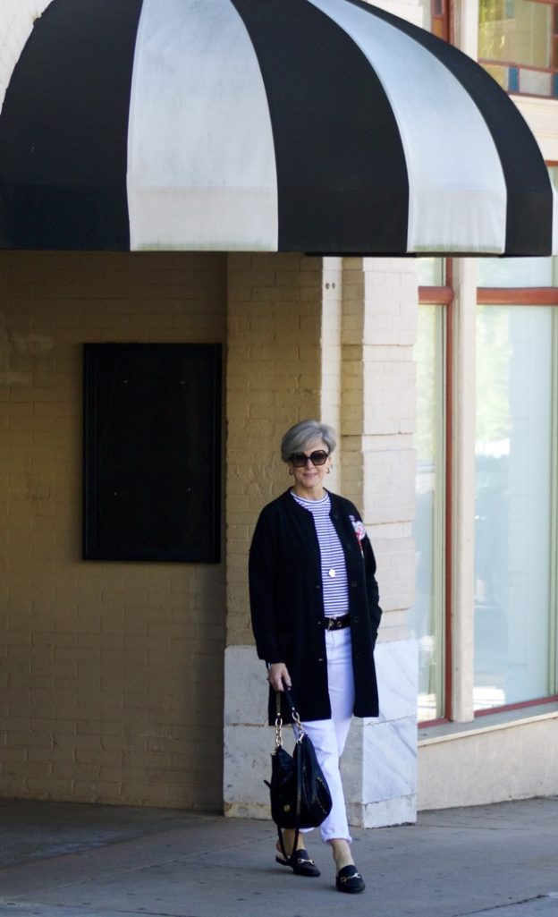 black cardigan, white denim, black mules