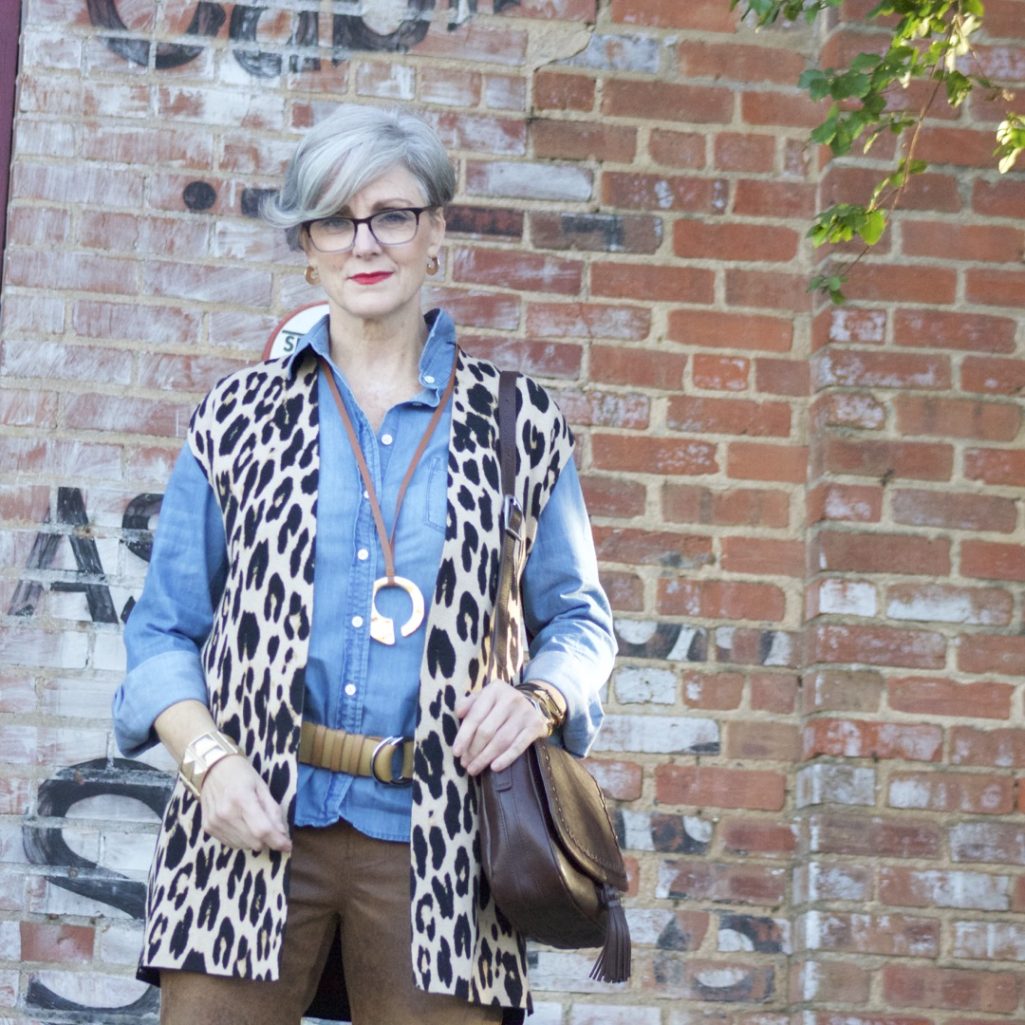 chico's leopard vest, faux leather leggings, denim shirt