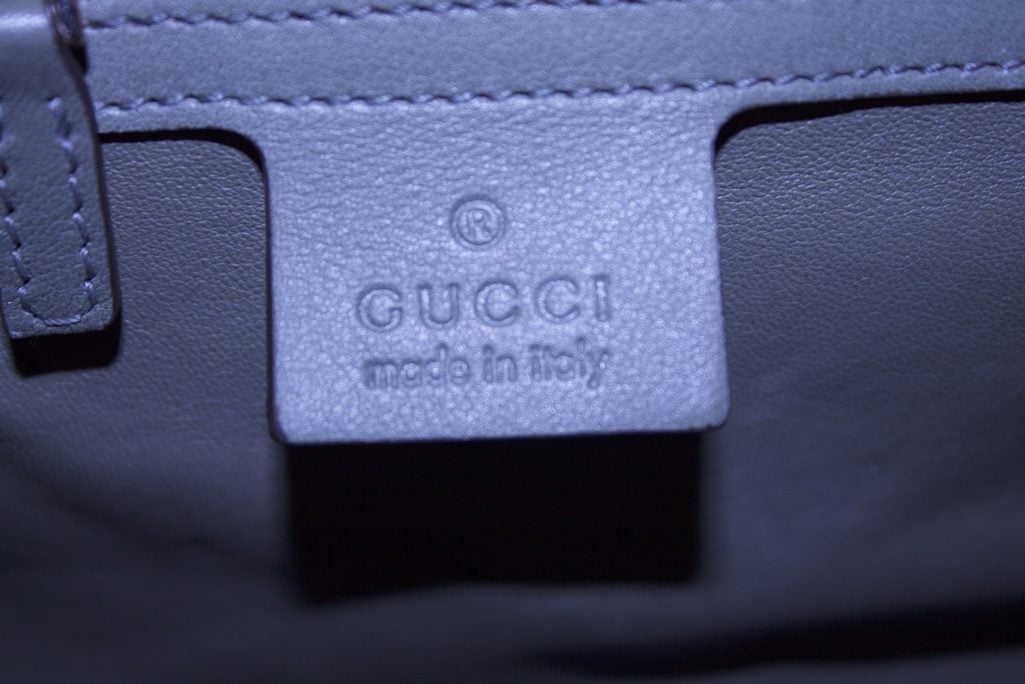 gucci python handbag with bamboo handles