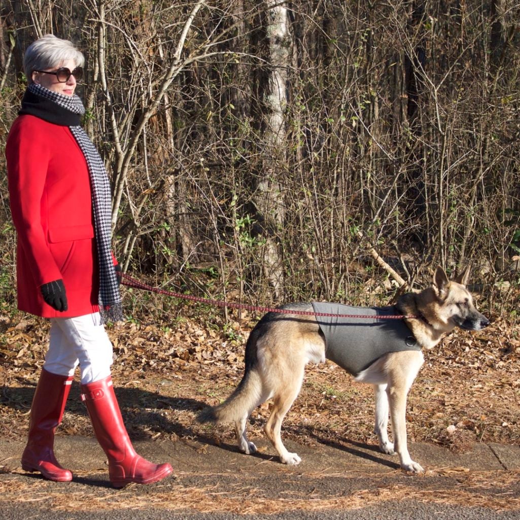red stadium coat, striped crewneck, white denim, red hunter boots, houndstooth cashmere scarf