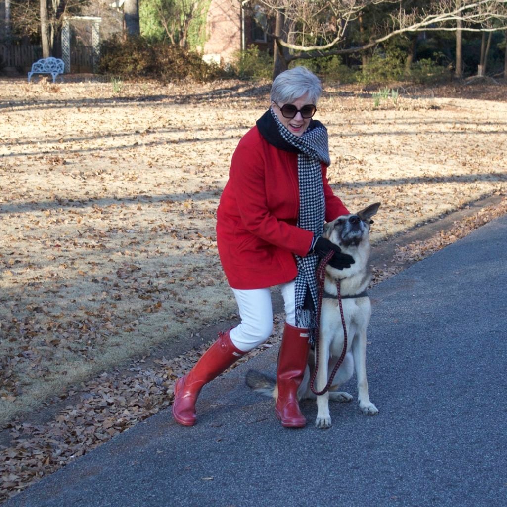 red stadium coat, striped crewneck, white denim, red hunter boots, houndstooth cashmere scarf