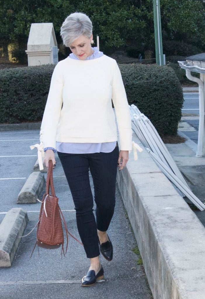ann taylor grommet sweater, striped ruffled shirt, denim, everlane loafers
