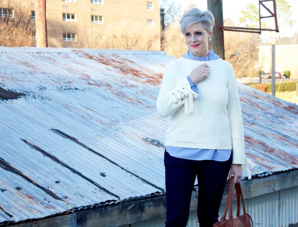 ann taylor grommet sweater, striped ruffled shirt, denim, everlane loafers