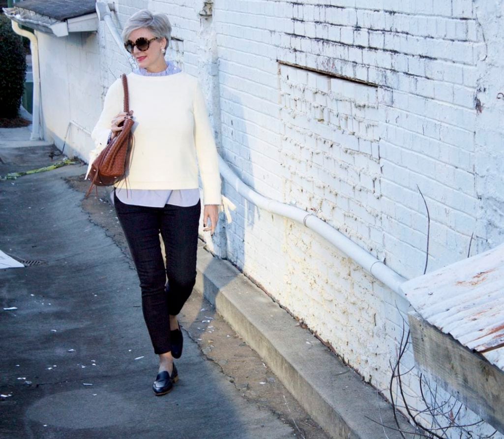 ann taylor grommet sweater, striped ruffled shirt, denim, everlane loafers