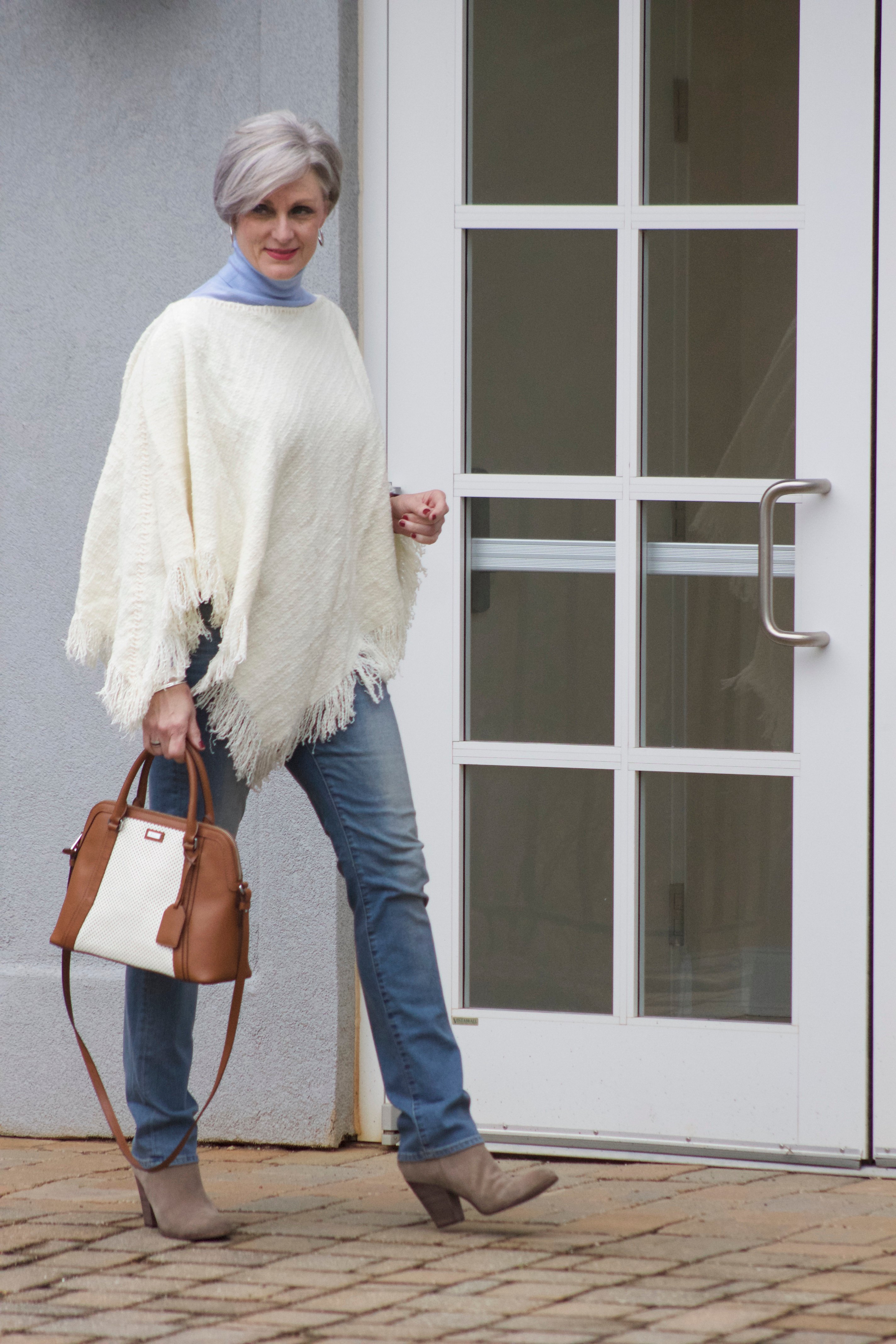 put a poncho on