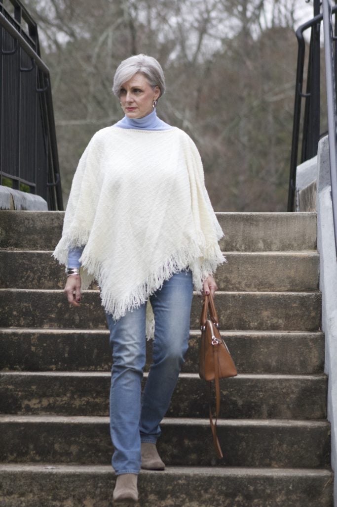 put a poncho on
