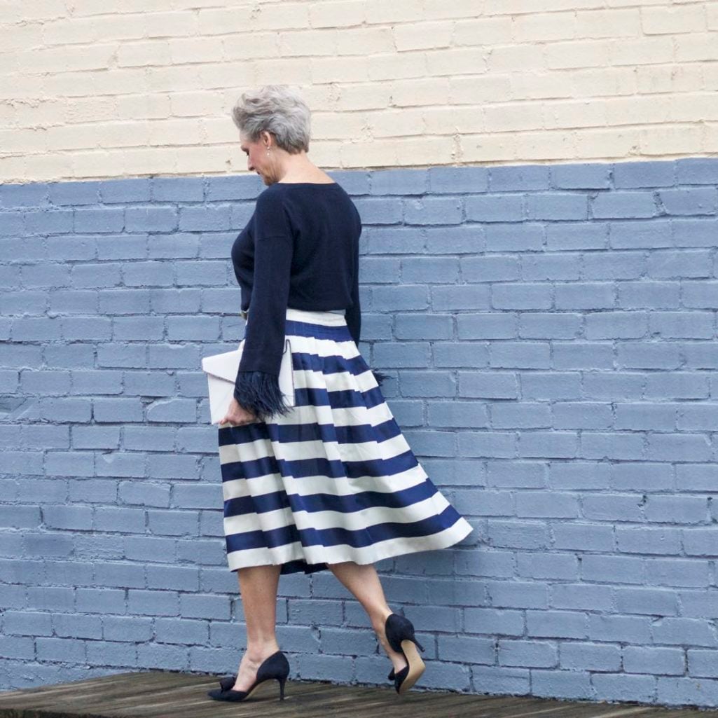 j.crew feather sleeve crewneck sweater, j.crew pleated satin stripe skirt, nine west suede pumps, rebecca minkoff leo envelope clutch