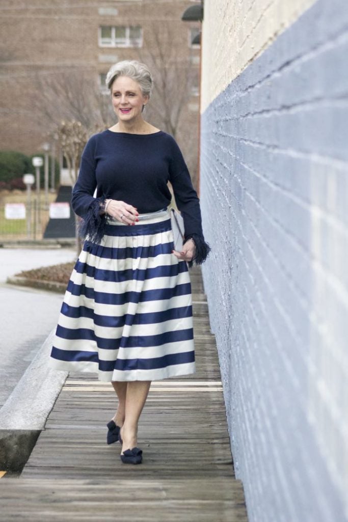 j.crew feather sleeve crewneck sweater, j.crew pleated satin stripe skirt, nine west suede pumps, rebecca minkoff leo envelope clutch