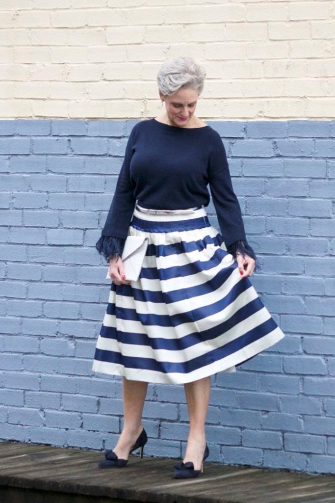 j.crew feather sleeve crewneck sweater, j.crew pleated satin stripe skirt, nine west suede pumps, rebecca minkoff leo envelope clutch