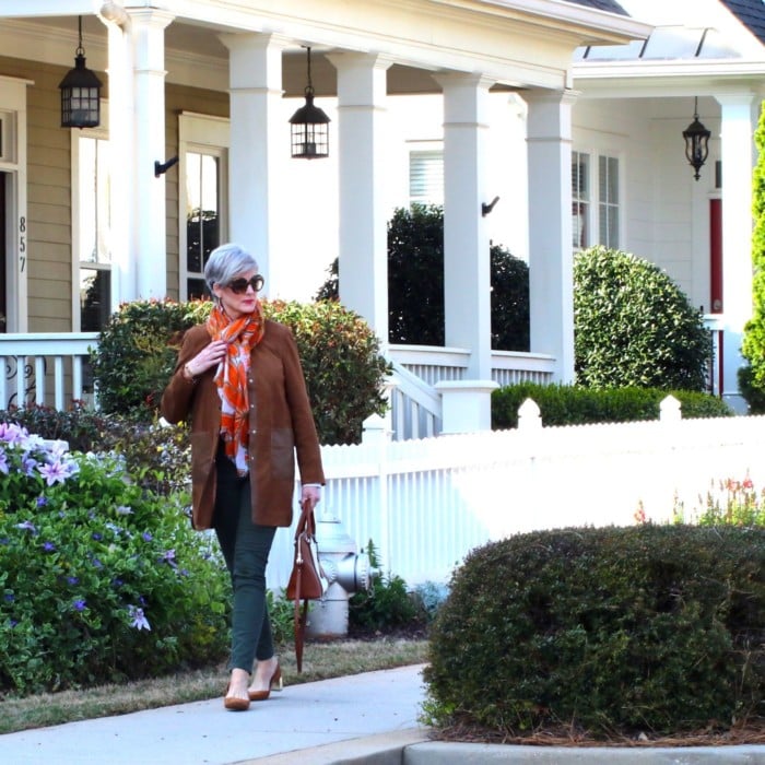 shifting into neutral with suede duster, white shirt, and green cargo pants