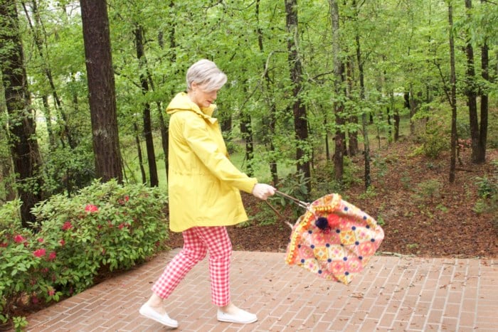 marks and spencer yellow slicker, boden gingham pants, boden cashmere sweater, sperry sneakers, trina turk tote, over 50 fashion blogger