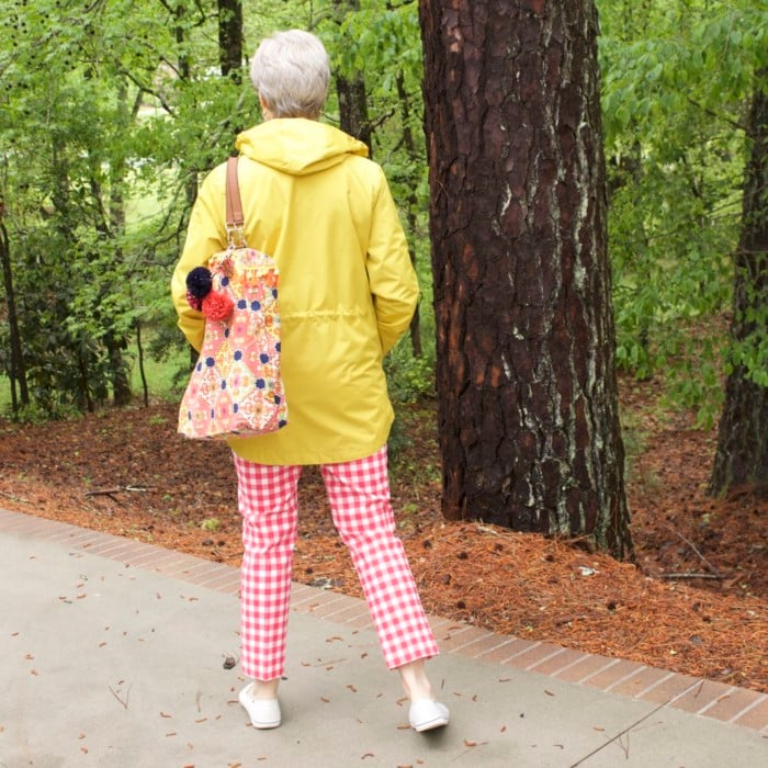 marks and spencer yellow slicker, boden gingham pants, boden cashmere sweater, sperry sneakers, trina turk tote, over 50 fashion blogger