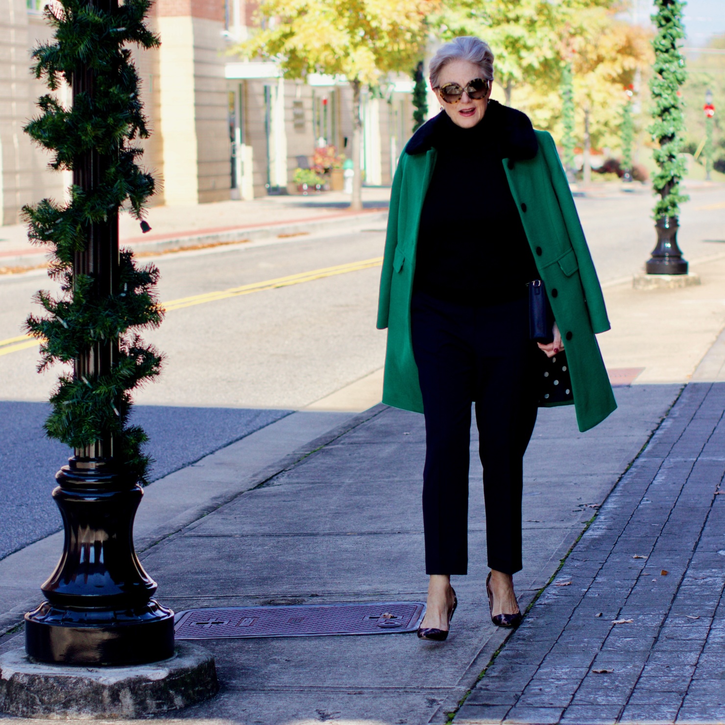beth from Style at a Certain Age wears an Everlane cashmere turtleneck, Italian weave ankle pants, leopard pumps, and Talbots green overcoat