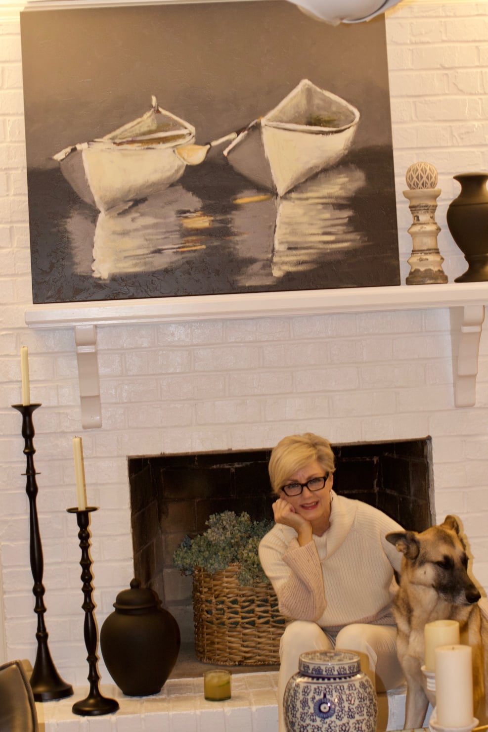 beth from Style at a Certain Age wears a cashmere color block sweater, slim leg ivory pants, cap toe ballet flats