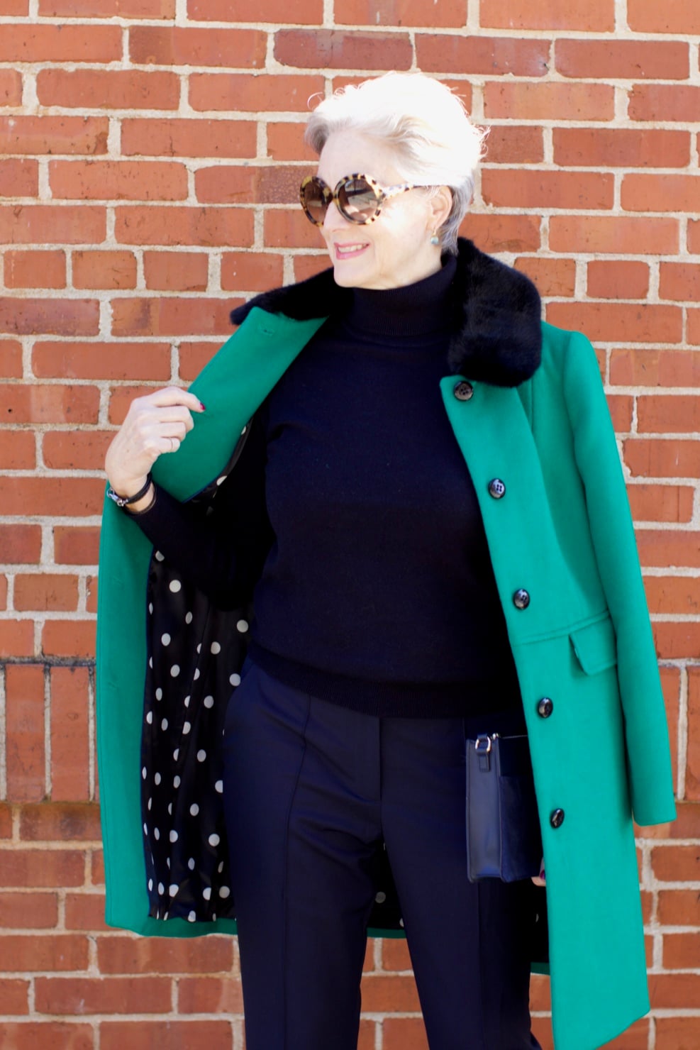 beth from Style at a Certain Age wears an Everlane cashmere turtleneck, Italian weave ankle pants, leopard pumps, and Talbots green overcoat