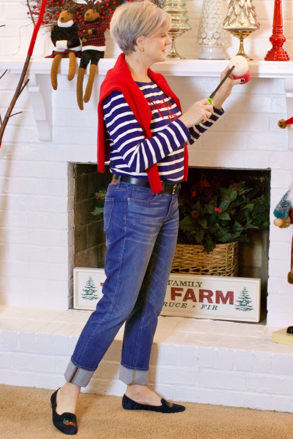 beth from Style at a Certain Age wears a Talbots jingle belle striped tee, J.Crew jeans, and embroidered smoking slippers