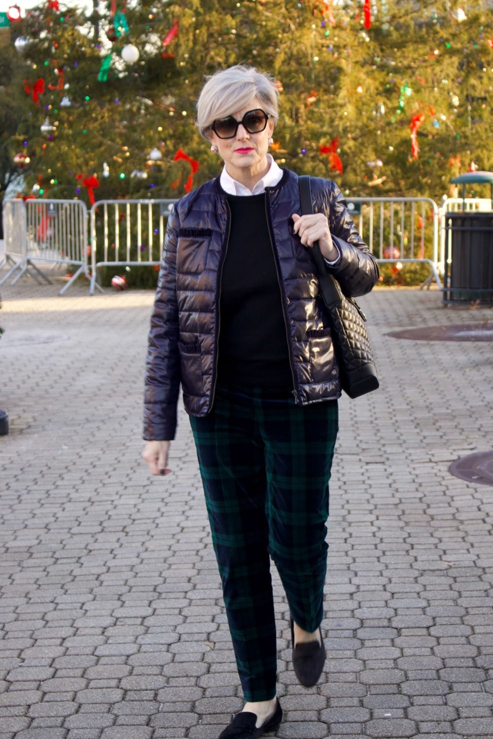 Christmas in the City - beth from Style at a Certain Age wears Talbots black watch plaid ankle pants, Everland black cashmere crewneck, Talbots navy puffer jacket