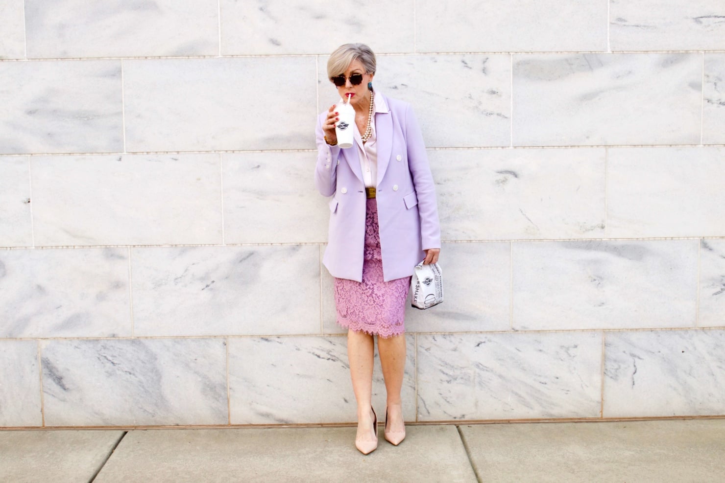 beth of Style at a Certain Age wears a double breasted blazer, lace skirt, charmeuse blouse and nude pumps for New Year's Eve