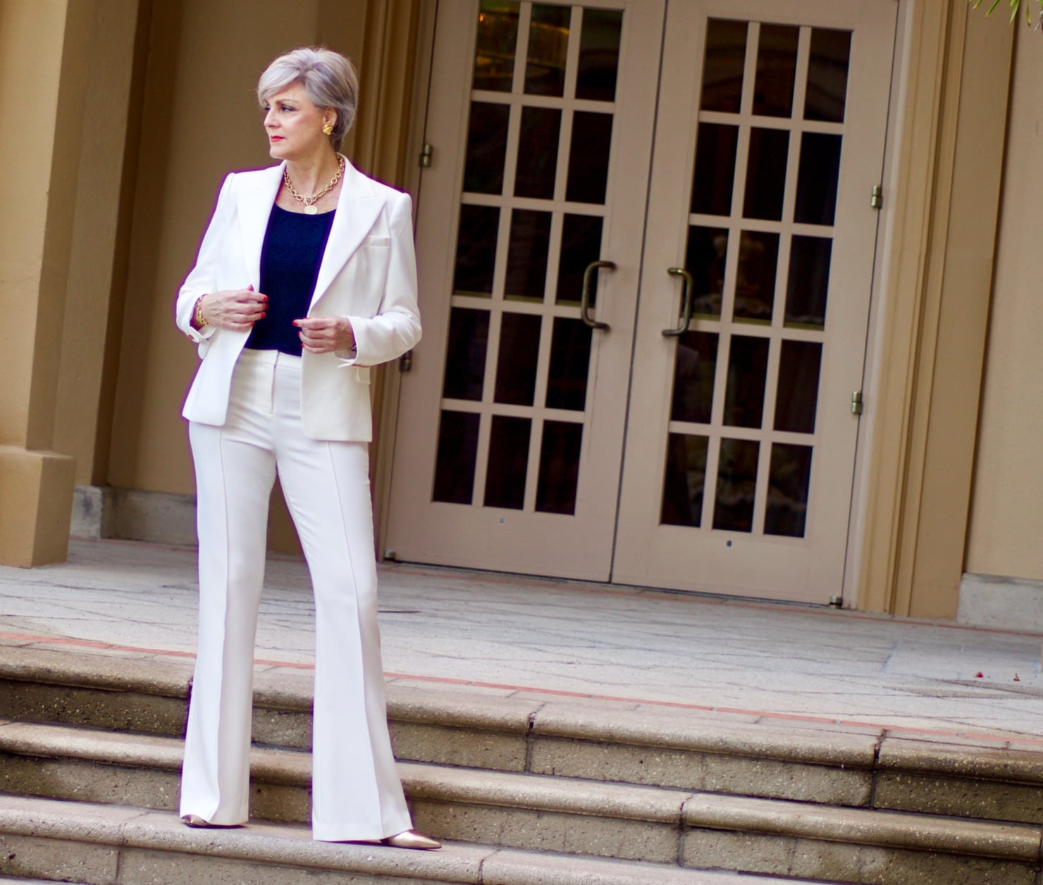 beth from Style at a Certain Age wears a Kobi Halperin ivory structured blazer, ivory trouser pant from Halsbrook