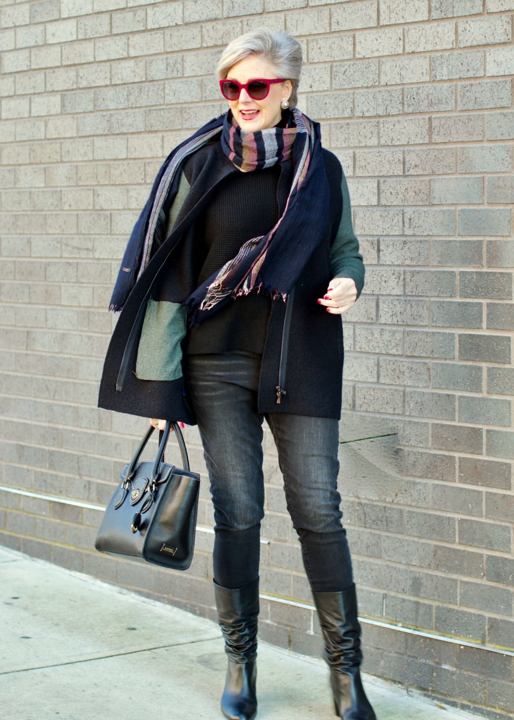 beth from Style at a Certain Age wears an Everlane cashmere waffle square turtleneck, J.Crew Factory black high rise skinny jean, Ann Taylor coatigan, Via Spiga black slouchy boots, Ralph Lauren black handbag, and wool scarf