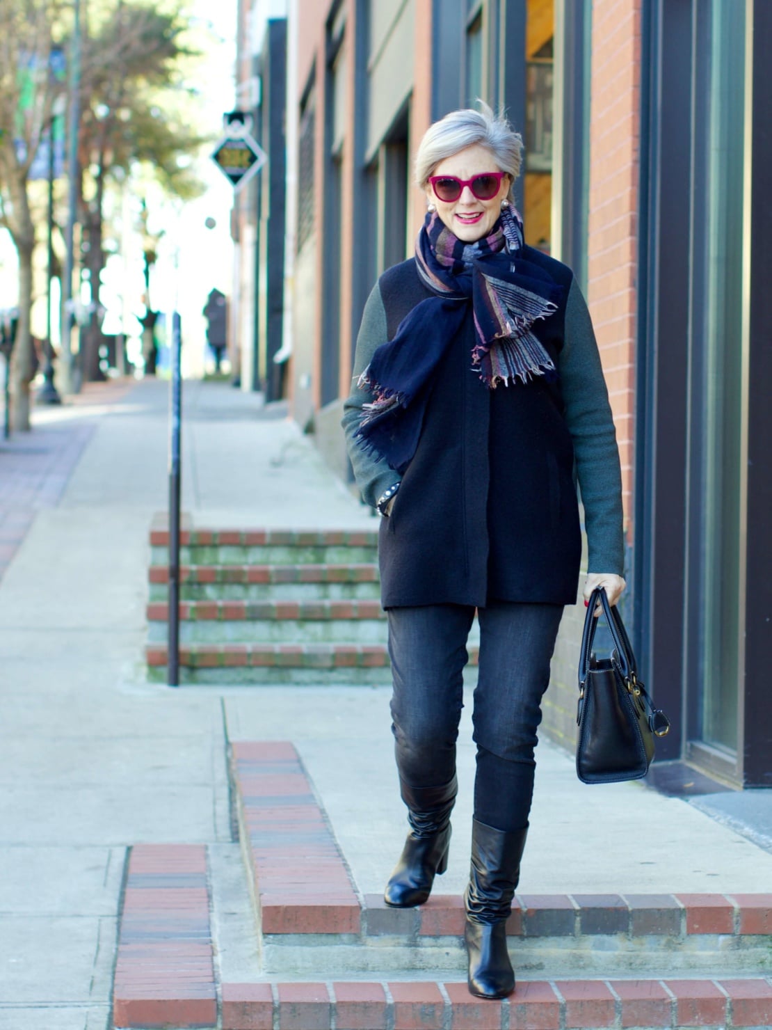 beth from Style at a Certain Age wears an Everlane cashmere waffle square turtleneck, J.Crew Factory black high rise skinny jean, Ann Taylor coatigan, Via Spiga black slouchy boots, Ralph Lauren black handbag, and wool scarf
