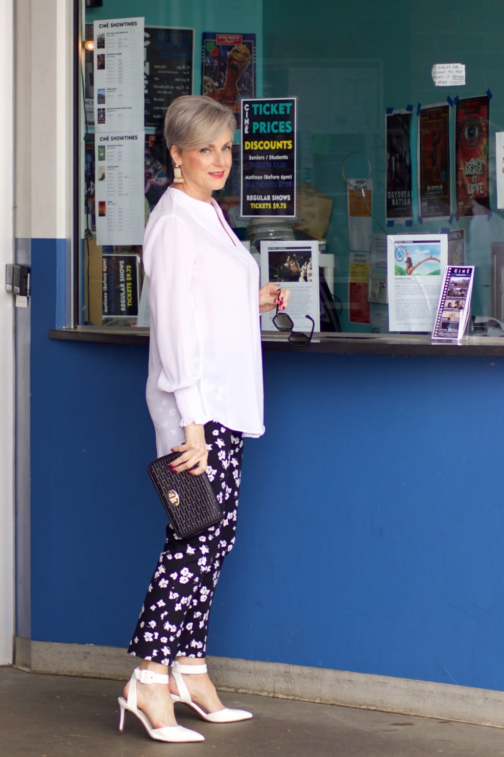 beth from Style at a Certain Age wears an outfit from Lord & Taylor, black pattern pants, white tunic blouse, Sam Edelman shoes