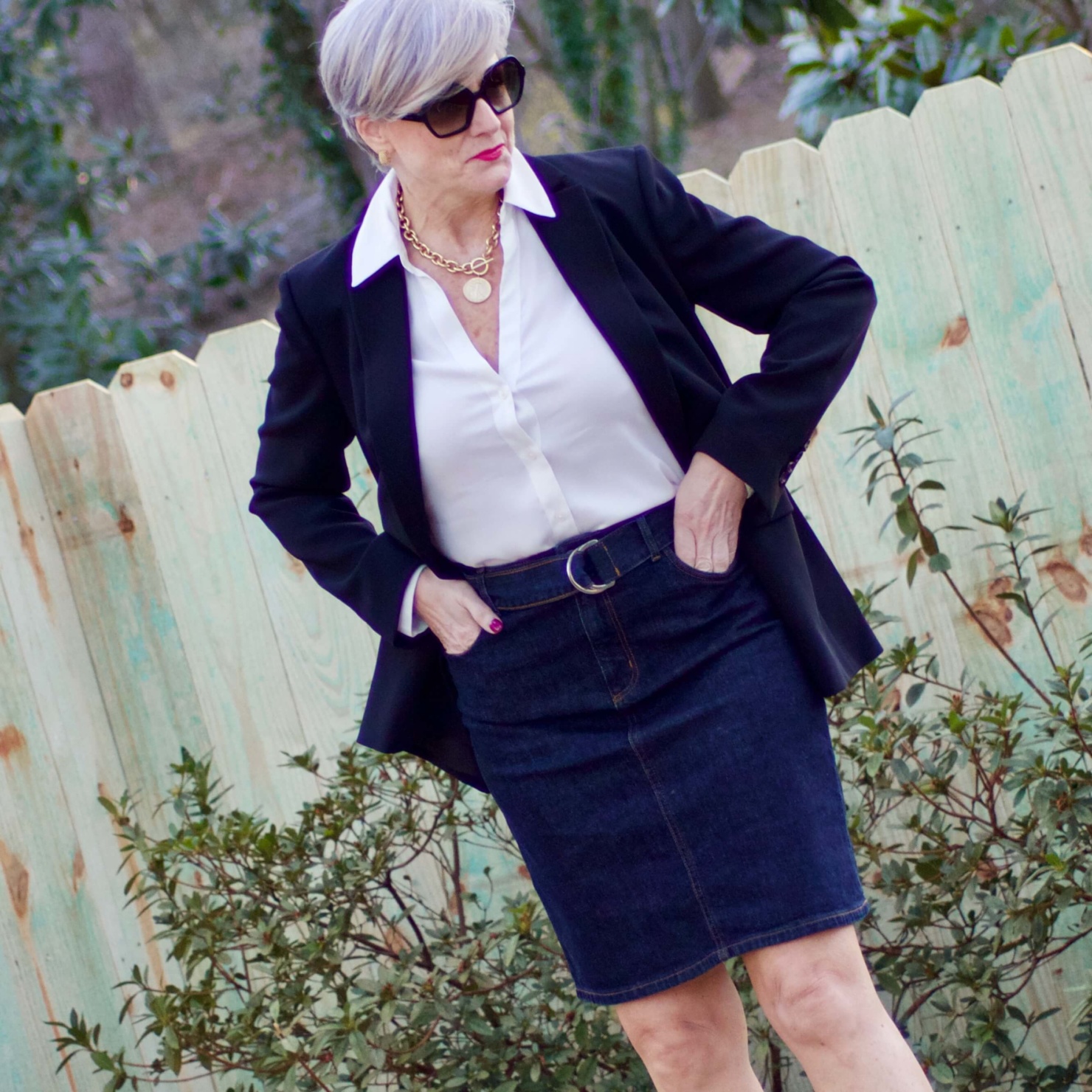 beth from Style at a Certain Age wears Ann Taylor denim skirt, white essential blouse, black blazer and snake print sandals