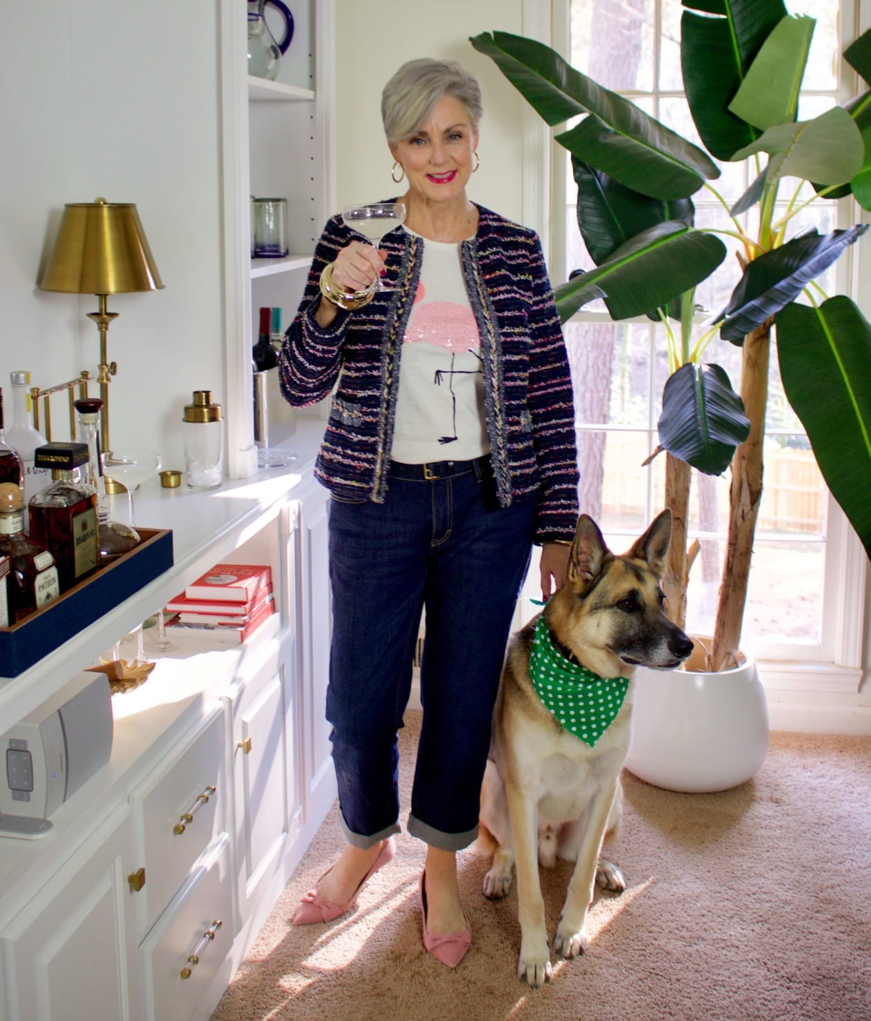 beth from Style at a Certain Age wears boyfriend jeans, graphic tee, tweed blazer and pink kitten heels