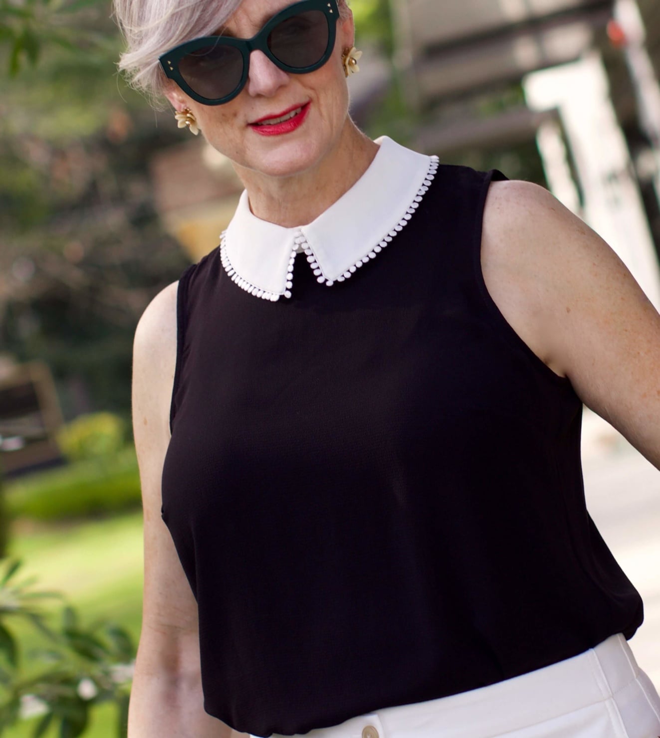 what to wear to work wide leg pants, black blouse, and suede sandals