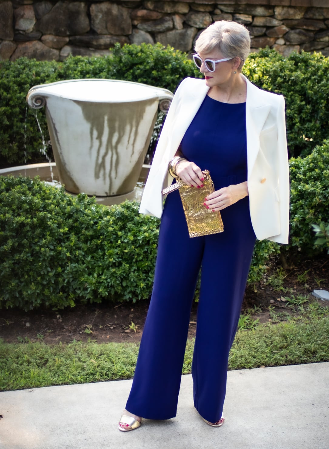 blue jumpsuit and white blazer