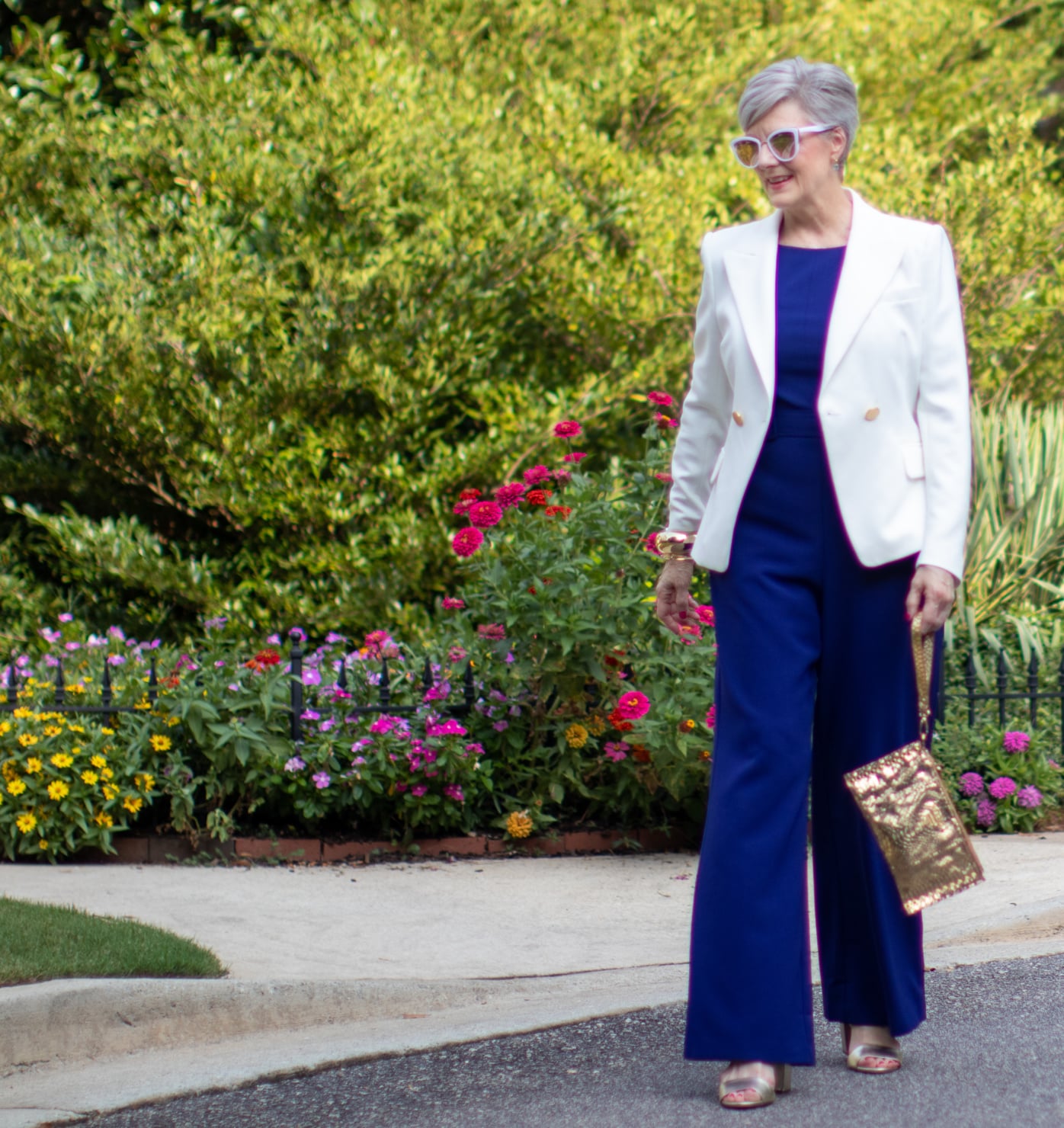 blue jumpsuit and white blazer