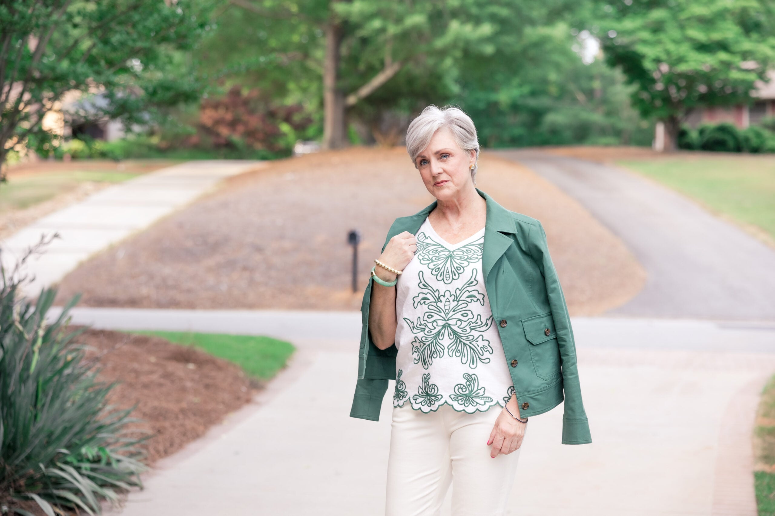 green cropped jacket outfit