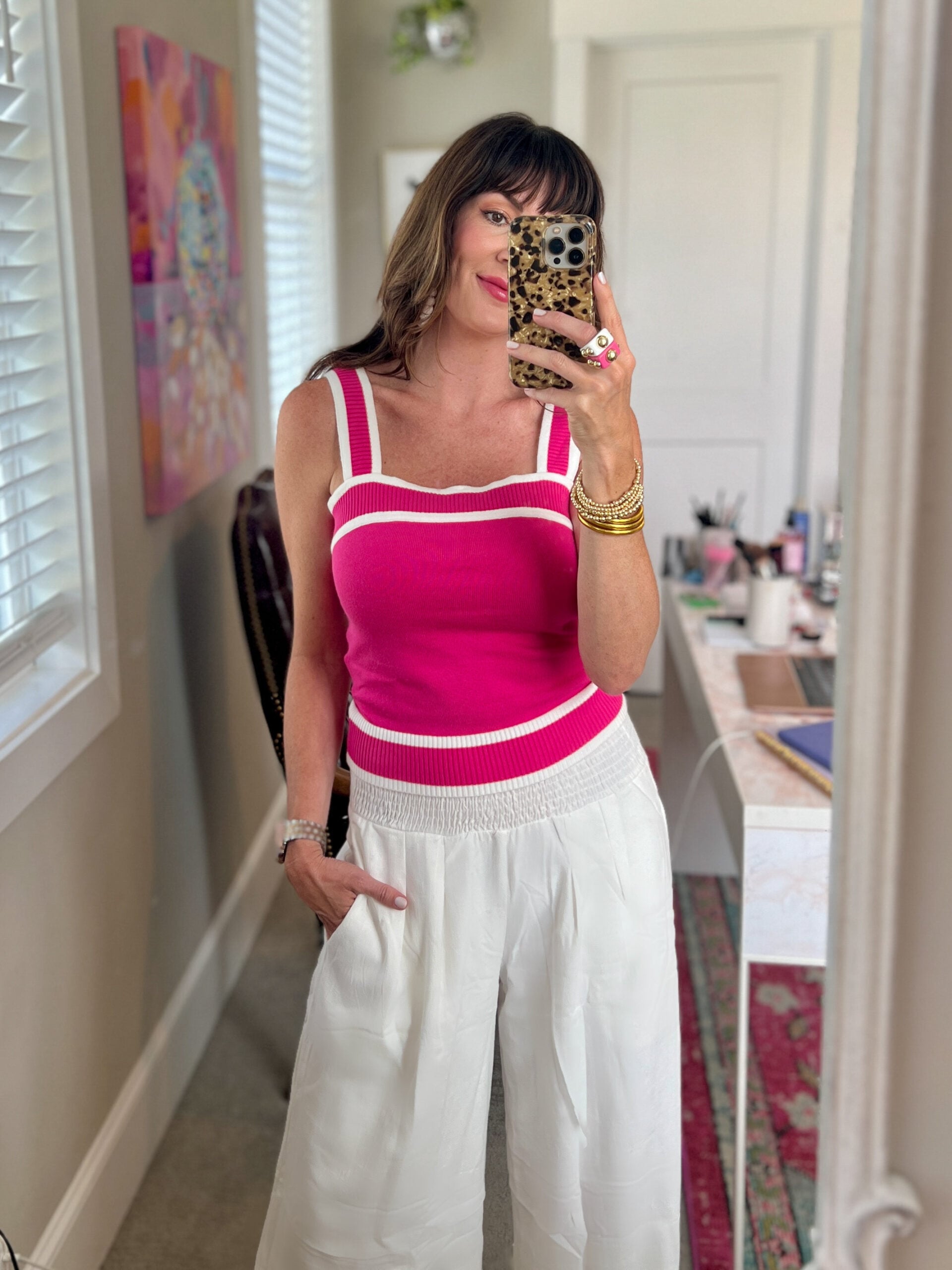 pink top white pants outfit