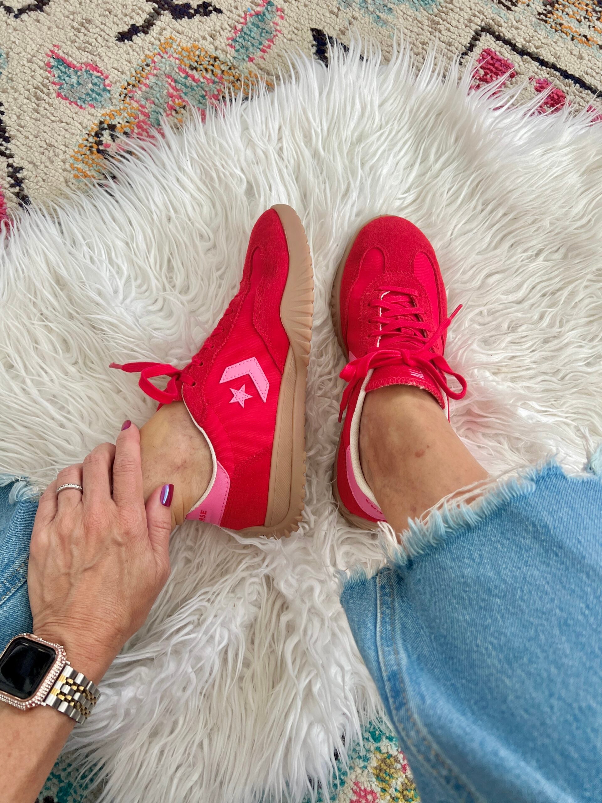 red and pink converse shoes