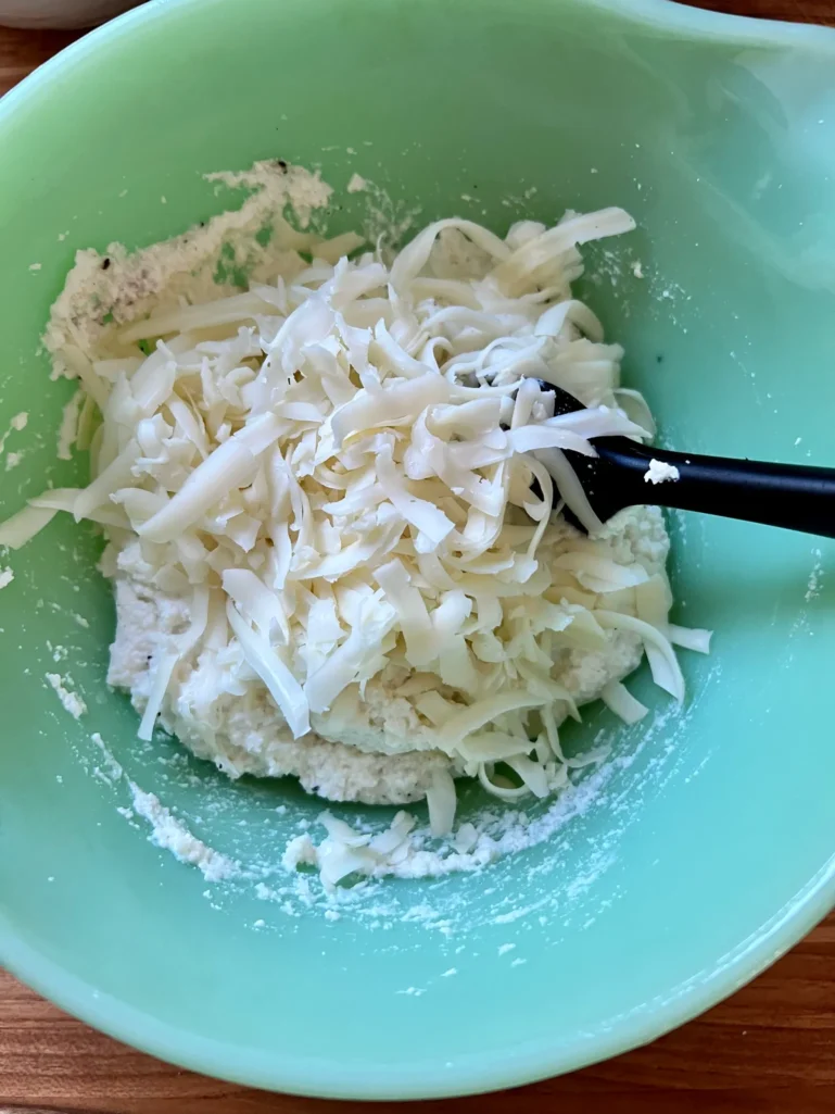 mixing the cheeses for the Christmas eve lasagna