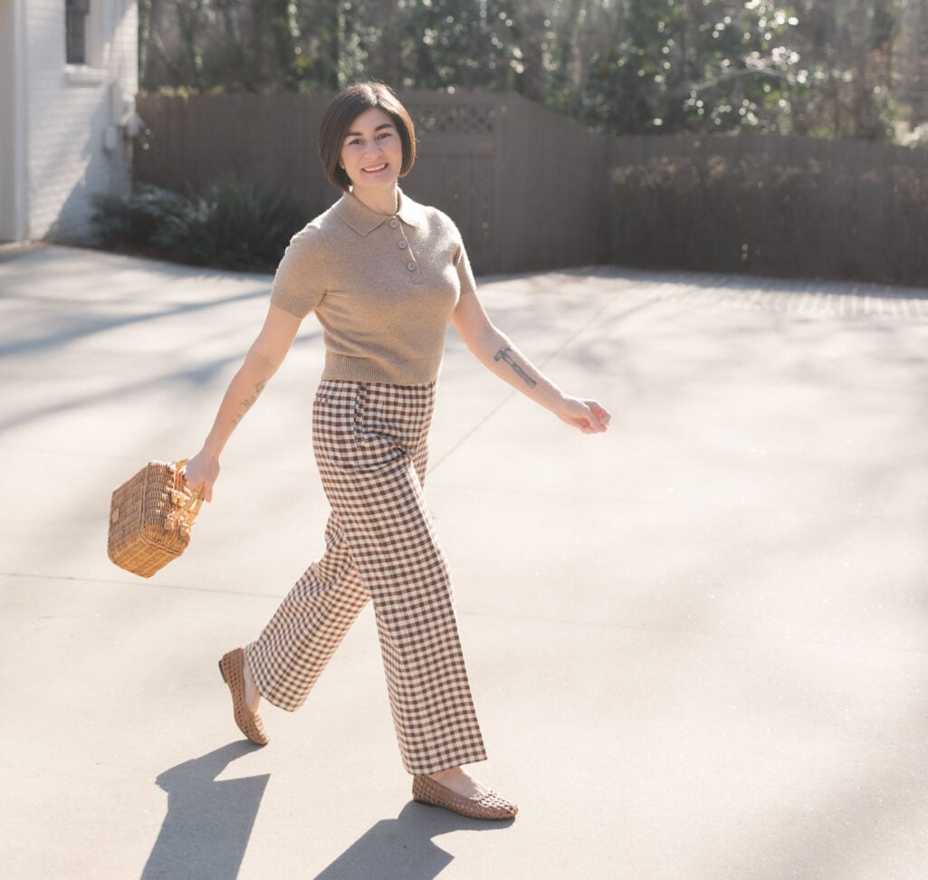 polo sweater, wicker handbag, woven ballet flats, gingham trousers