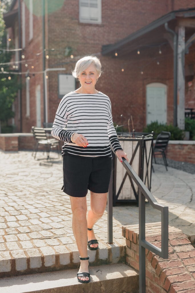Breathable fabrics like linen, cotton, and bamboo for hot weather fashion over 50