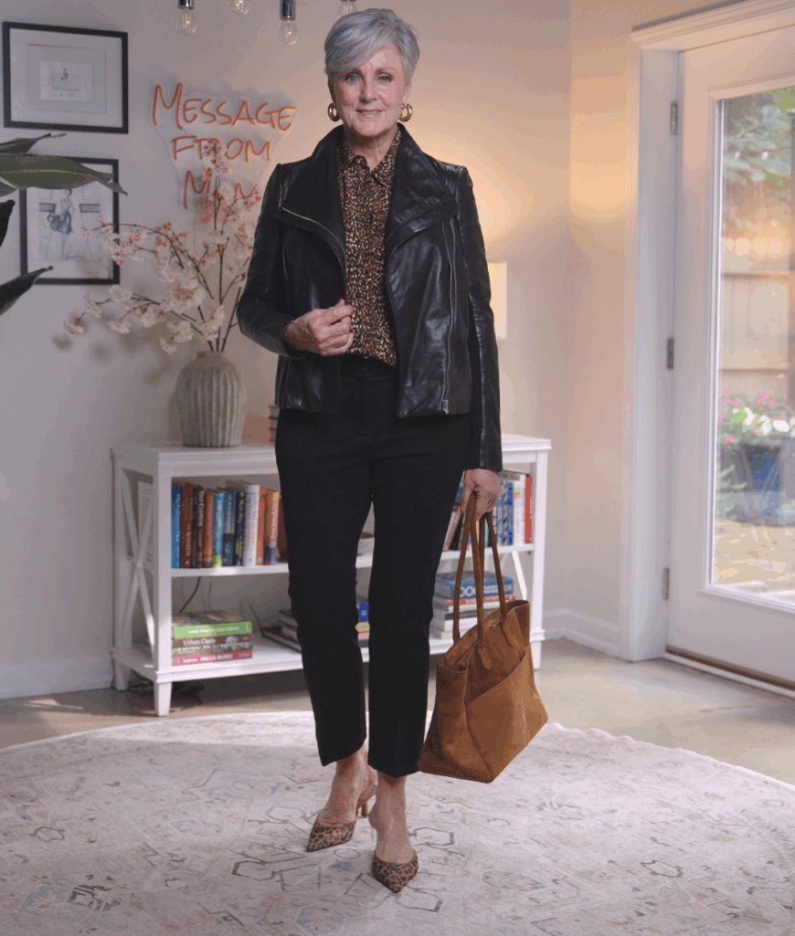 Black moto jacket with slim black pants and leopard shoes, chic fall outfit for women over 50