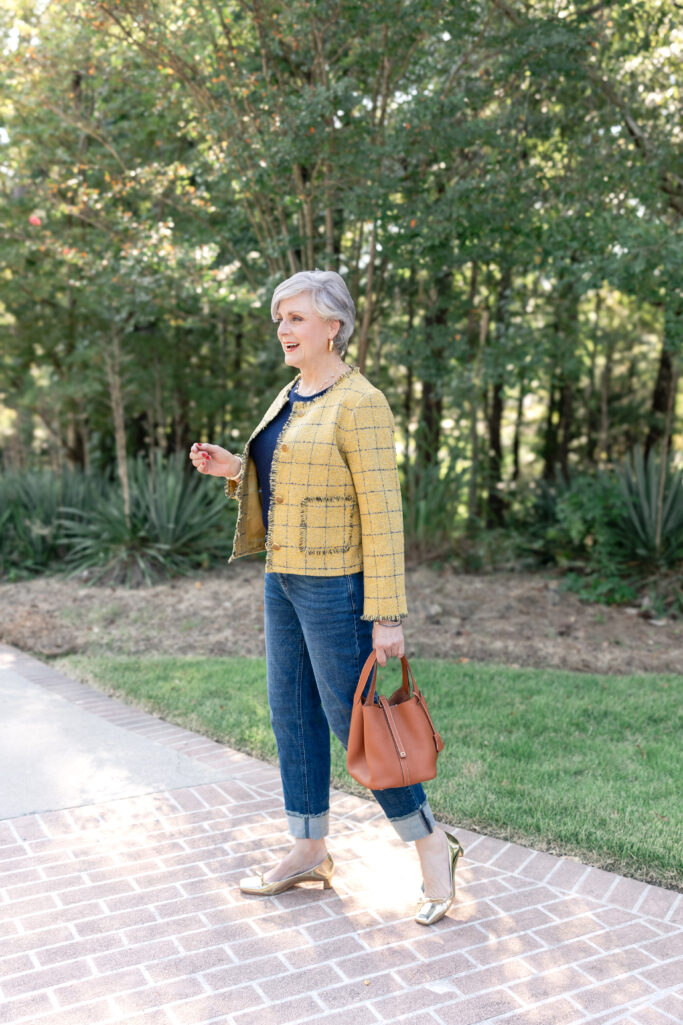 Style at a Certain Age fall outfit inspiration: yellow plaid jacket, denim, gold flats, and timeless accessories for confident dressing. Golden Moments Golden Bachelor