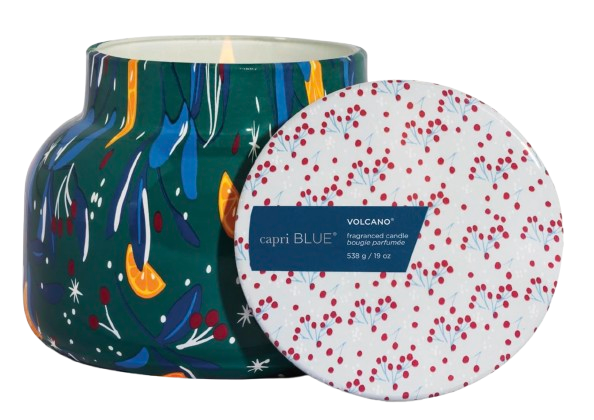 19-ounce Capri Blue Volcano Candle in a playful holiday pattern on a deep green background featuring abstract holly, oranges, and stars