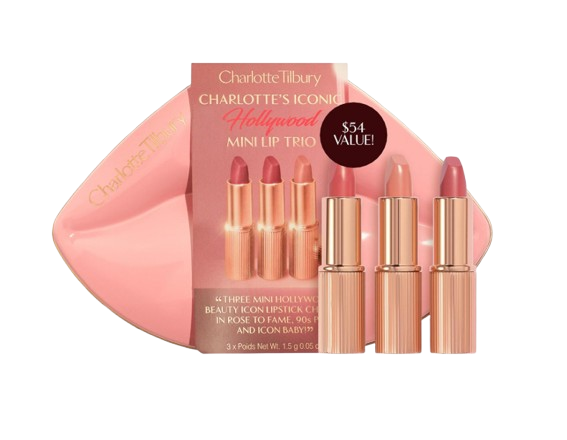 Charlotte Tilbury Iconic Hollywood Mini Lip Trio set showing three mini lipsticks in rose and neutral shades, packaged in a pink holiday gift box; includes bestselling Hollywood-inspired lipstick colors.