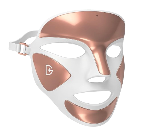 Dr. Dennis Gross DRx SpectraLite FaceWare Pro LED face mask in white with rose-gold accents, featuring eye and mouth openings and an adjustable head strap.