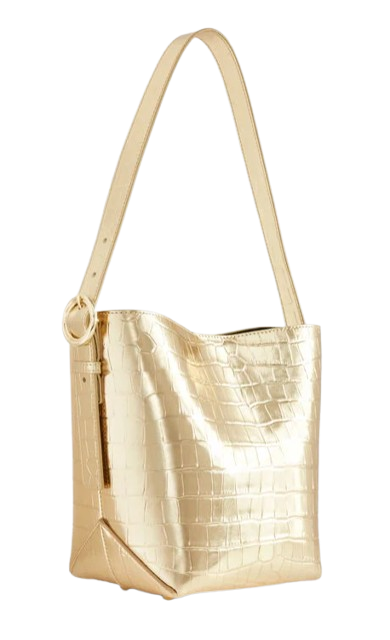 Metallic gold croc-embossed leather bucket bag with structured shape and long shoulder strap on white background.