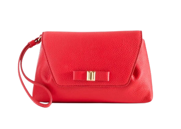 Red pebbled leather envelope wristlet with bow detail and gold hardware displayed on white background.