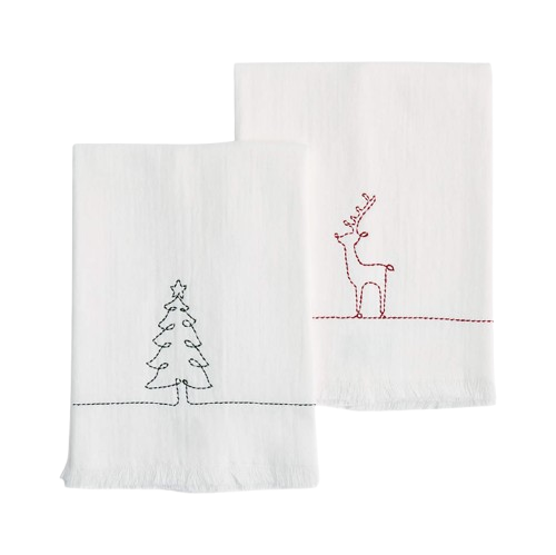 Crate & Barrel holiday guest towels in white cotton, embroidered with minimalist Christmas tree and reindeer designs in red and green, folded neatly for seasonal entertaining.