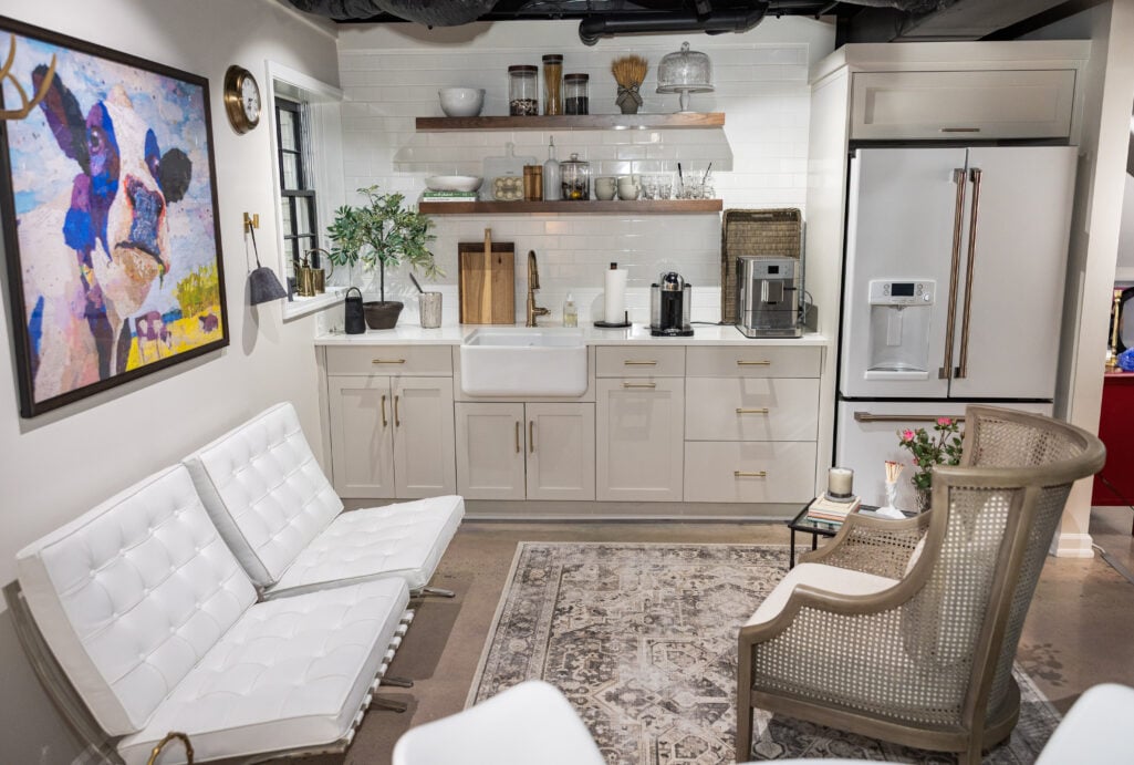 Beth Djalali's basement home office and YouTube studio with two styled zones for filming and team meetings.
