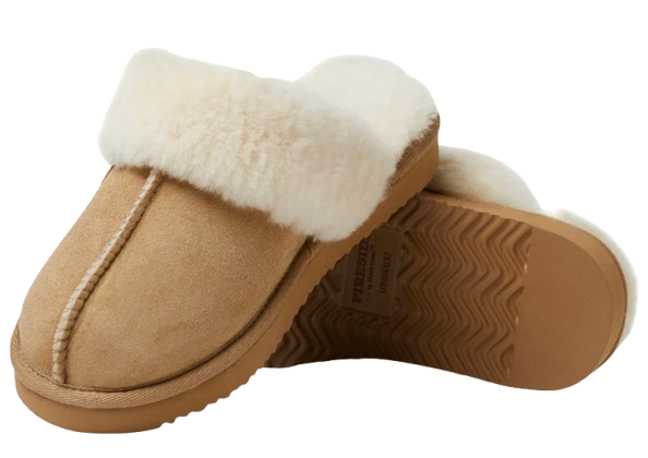 DEARFOAMS Fireside shearling slippers in tan suede with plush white sheepskin lining and durable rubber sole, shown from side and bottom views.