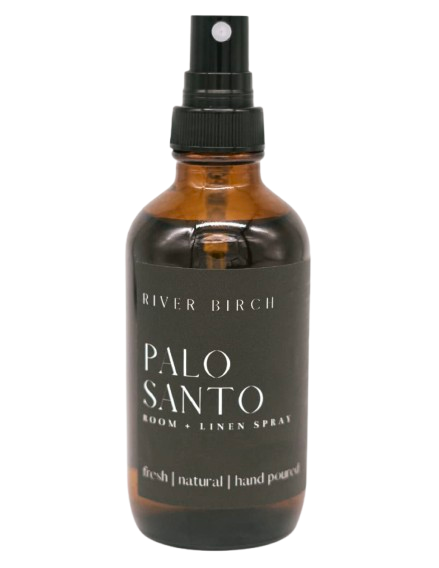River Birch Palo Santo room and linen spray in amber glass bottle with black spray top, labeled with minimalist black and white design.